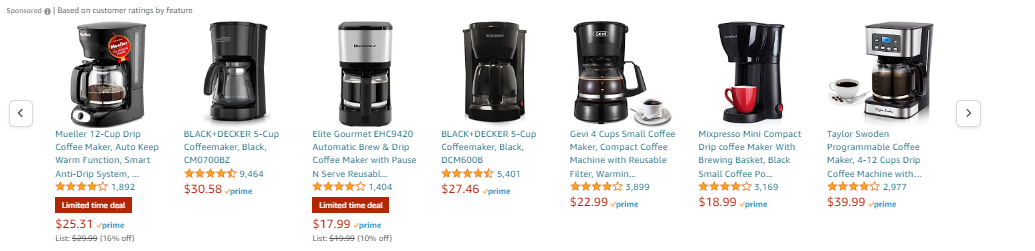 Description: Scrolling down on a coffee maker product listing, you can see additional Sponsored Products listed below. 

